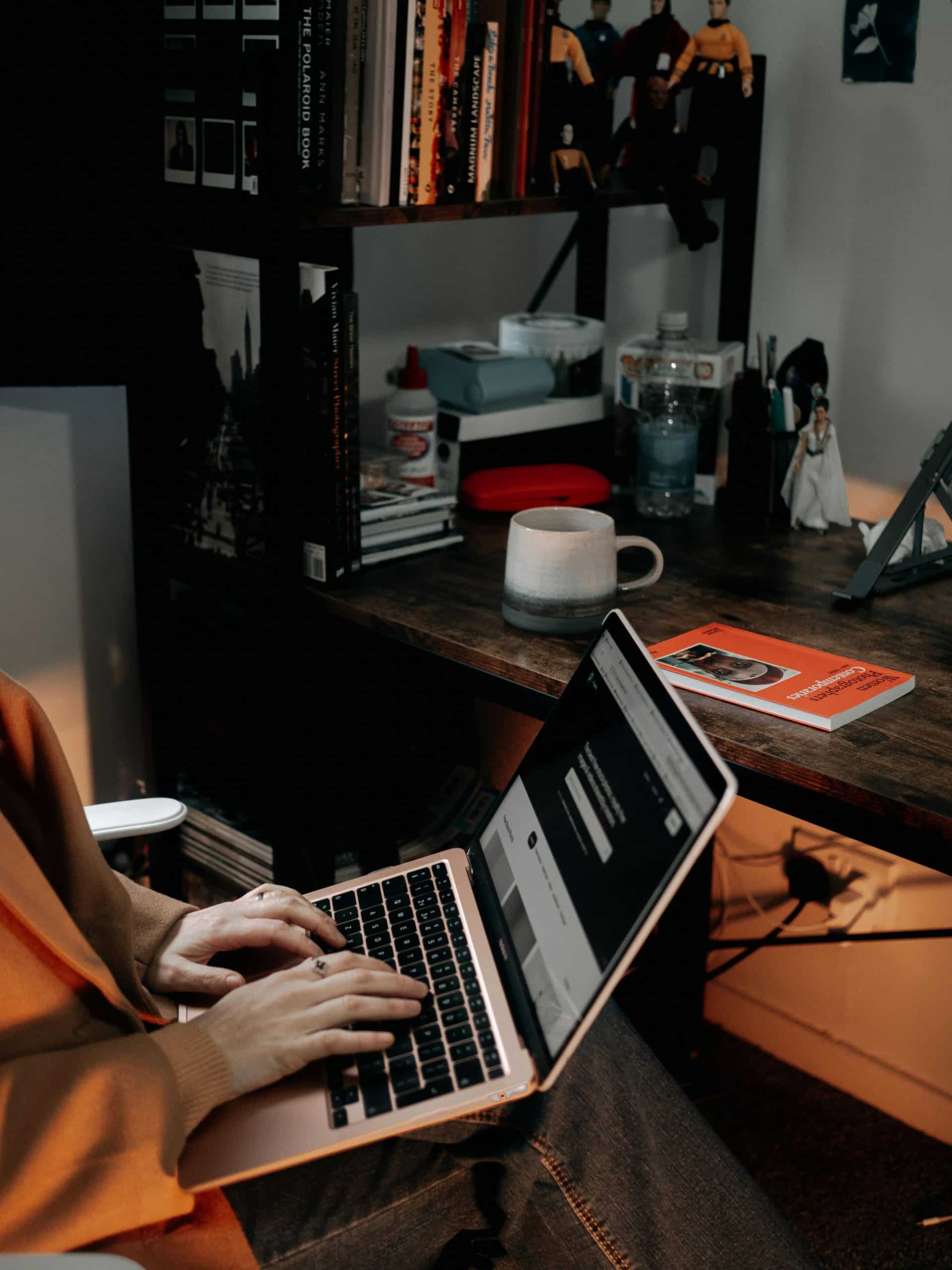 Person typing on a laptop